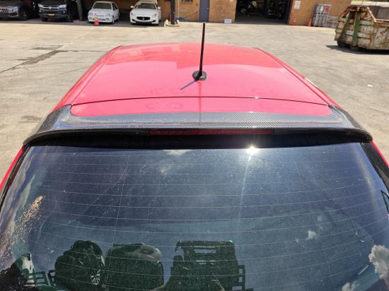 2015 Alfa Romeo Giulietta — Carbon Fibre Rear Spoiler – $450 (Stock No. NMW09422) Description: Achieve that race-ready look with this carbon fibre rear spoiler designed for the Alfa Romeo Giulietta Quadrifoglio Verde. Lightweight aerodynamic and finished in glossy carbon for a premium appearance. Genuine carbon fibre